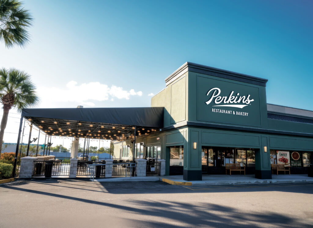 Exterior of the modernized Perkins Restaurant storefront at Turkey Lake Road in Orlando.